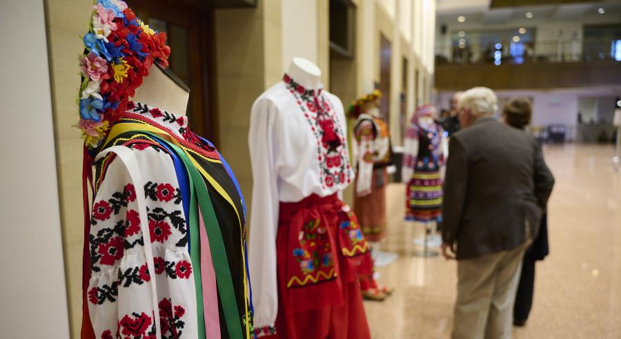 Colorful traditional Ukrainian outfits on display in the Northrop lobby.