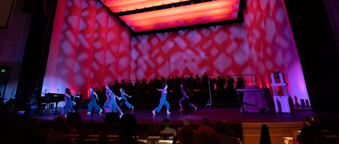 Dancers in blue perform during the Let Freedom Ring event.