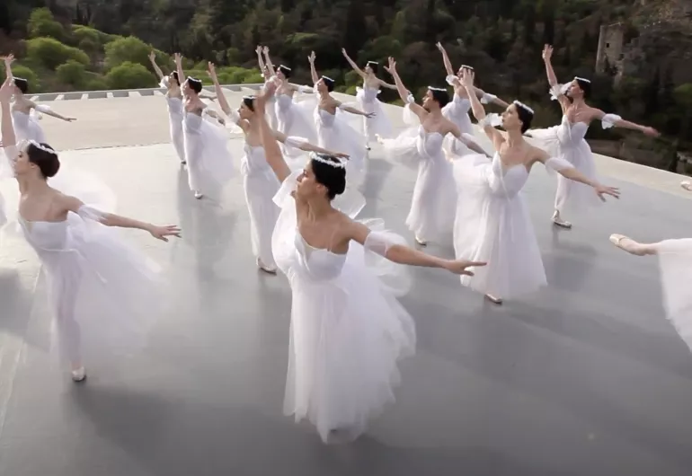 Ballet dancers perform on a rooftop