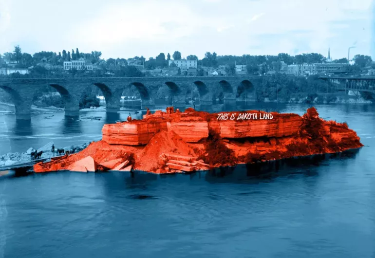 A blue monochrome image the Stone Arch Bridge in the Mississippi River with an island highlighted in red with the words "This is Dakota land'  written on it.