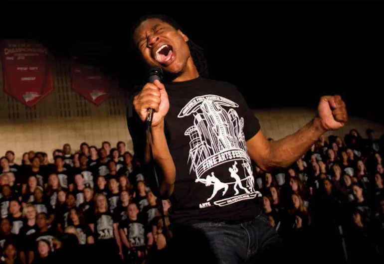 Young male singer on stage