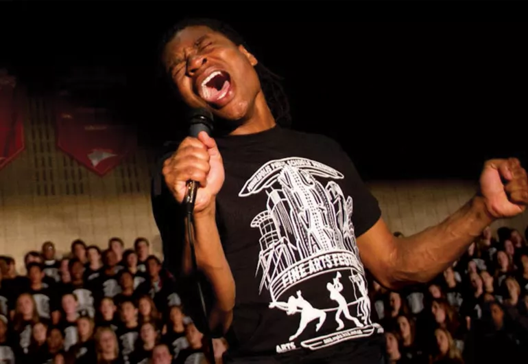 Young male singer on stage