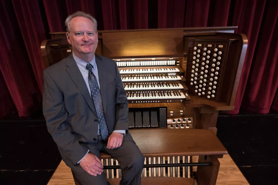 Dean Billmeyer sitting at the Northrop organ.