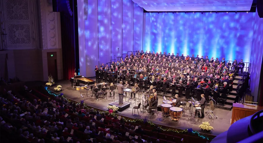 VocalEssence performs under colorful lights.