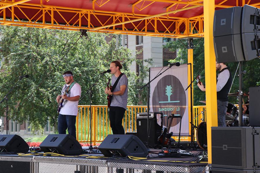 Dave Sandersfeld and his band on stage for Music on the Plaza.